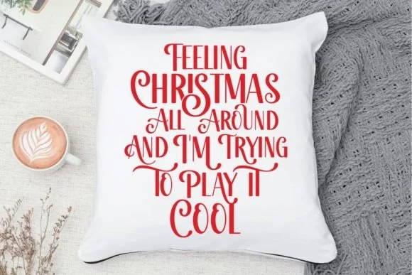 Handwritten font applied to gift packaging tags with red and cream palette